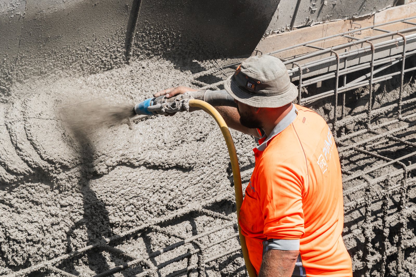 Wet concrete leaving the line onto a reinforced slab